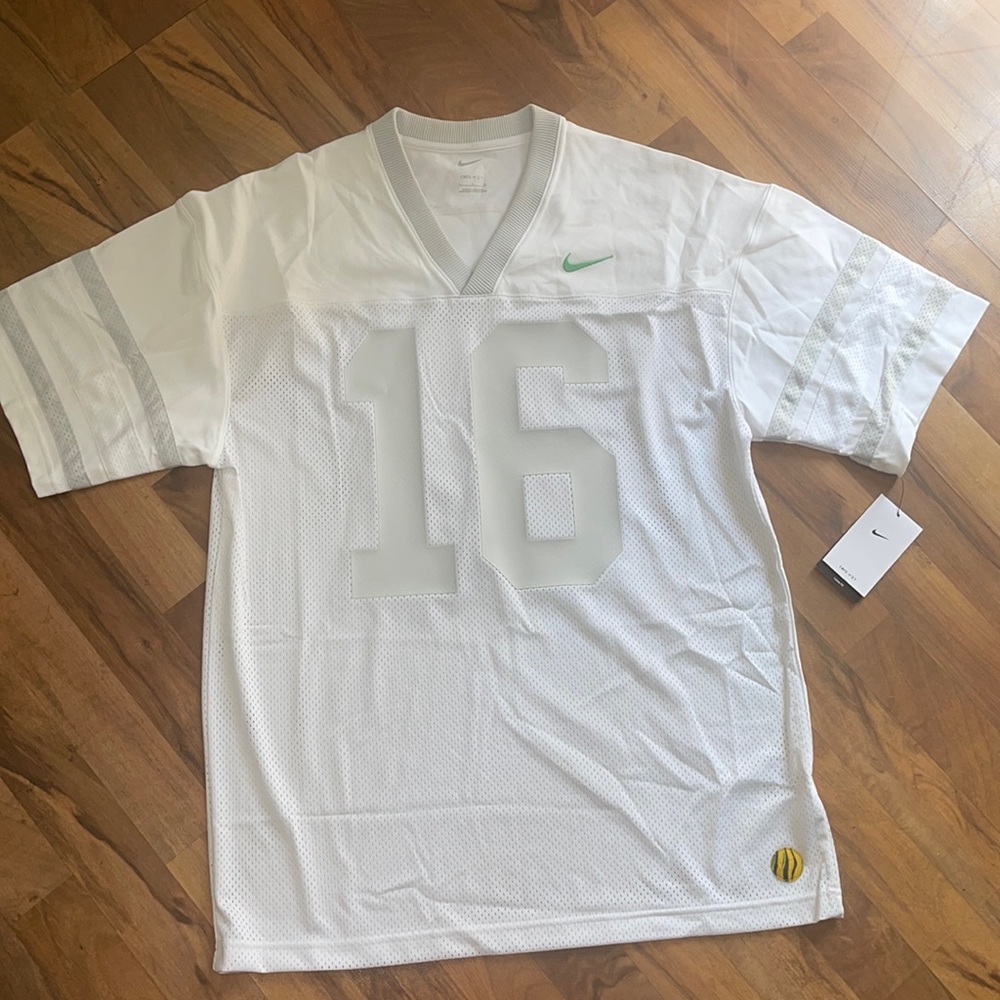 Nike White Men’s Jersey with Subtle Green Swoosh and Gray Details